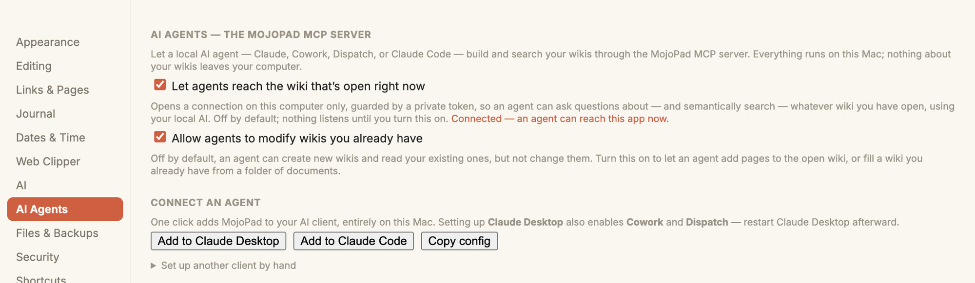 MojoPad's AI Agents settings: two consent switches for reaching and modifying wikis, and one-click buttons to add MojoPad to Claude Desktop or Claude Code